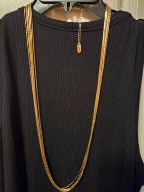 Multi snake chain goldtone necklace.